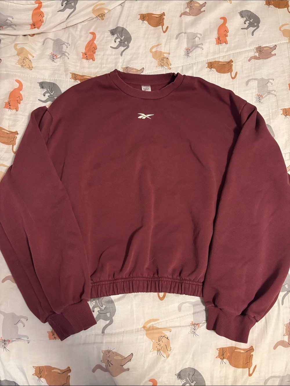 women’s burgundy reebok crewneck